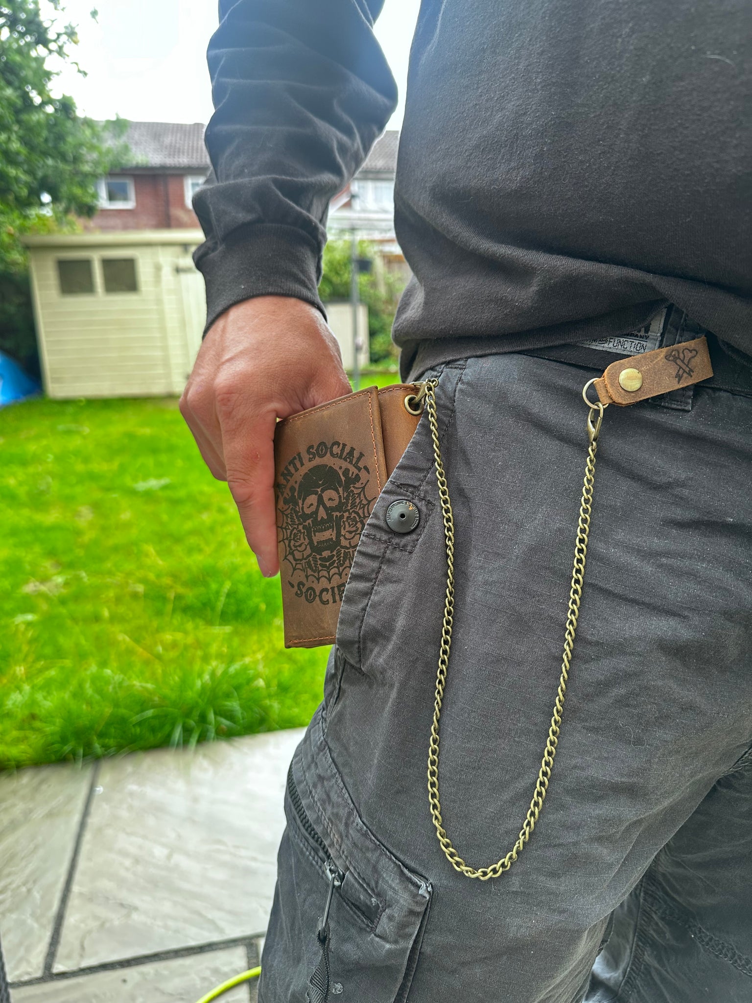 Leather wallet with detachable chain.